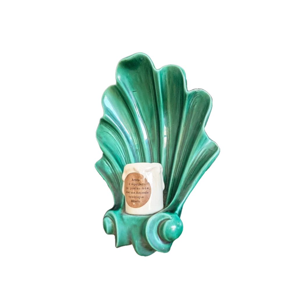 Side profile of emerald green glazed ceramic shell sconce showing depth and wall mount, 1950s France