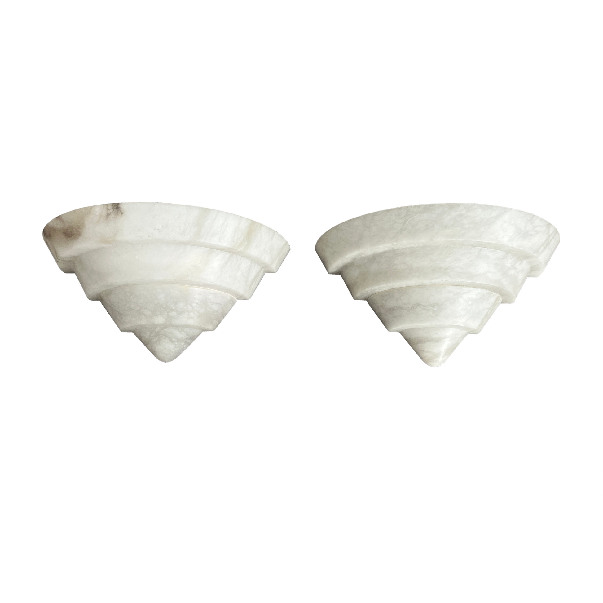 Pair of 1940s French Art Deco alabaster wall lights with tiered stepped silhouette
