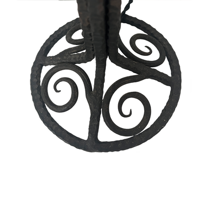 Detail of aged iron patina and hand-forged scrollwork on French Art Deco table lamp base
