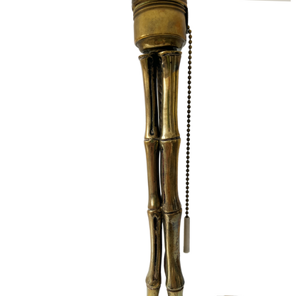 Close-up of hand-cast brass bamboo node detail on attributed Maison Bagues lamp