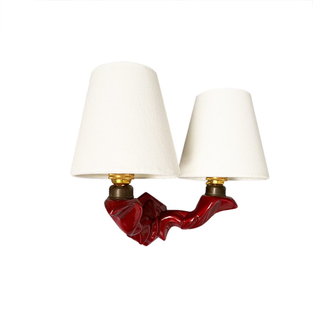 Close-up of deep burgundy garnet glaze on hexagonal ceramic base of French mid-century wall light