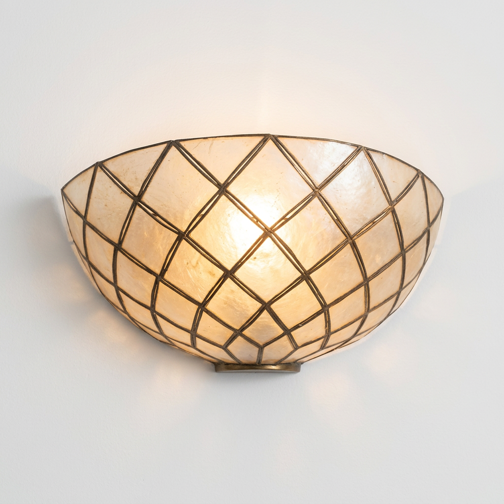 Mother-of-pearl luminosity and patina detail on 1950s Italian capiz shell sconce
