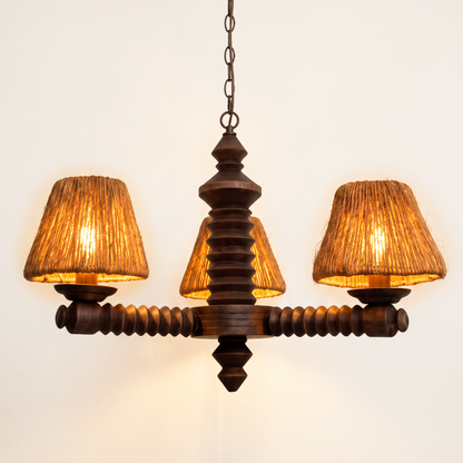 French carved wood three-arm chandelier attributed to Charles Dudouyt with jute shades, 1940s