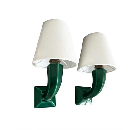 Pair of French Art Deco emerald green ceramic wall lights with white linen slip shades, 1940s