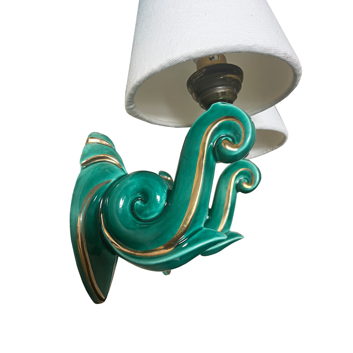 Side profile of mid-century French ceramic wall light showing sculptural curled arm form