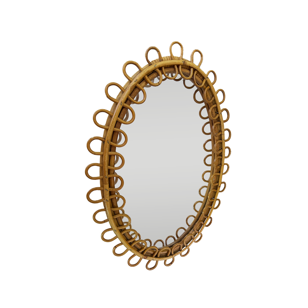 Honey-toned aged rattan patina and oval frame on 1960s Franco Albini style mirror