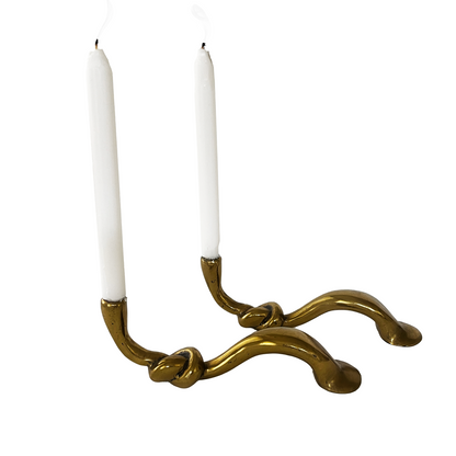 A Pair of Vintage Knot-Shaped Brass Candle Holders