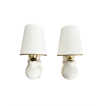 Pair of 1970s Italian white ceramic wall lights with gold trim and linen shades