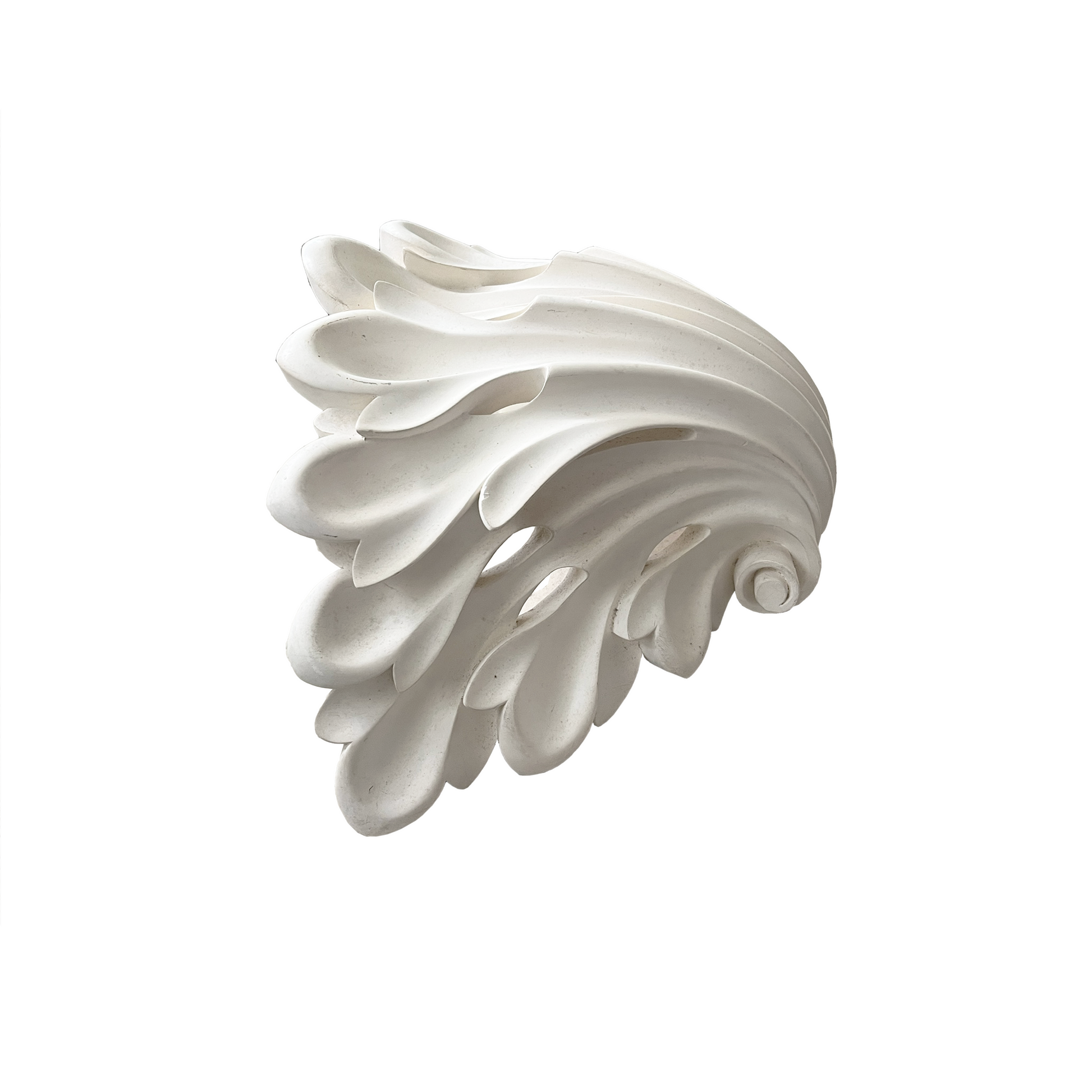 Close-up detail of the acanthus plaster leaf carving texture on its other side, vintage lighting