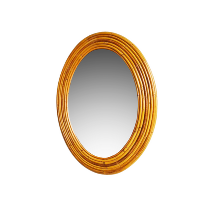 Close-up detail of hand-woven rattan texture and warm honey patina on vintage Italian mirror